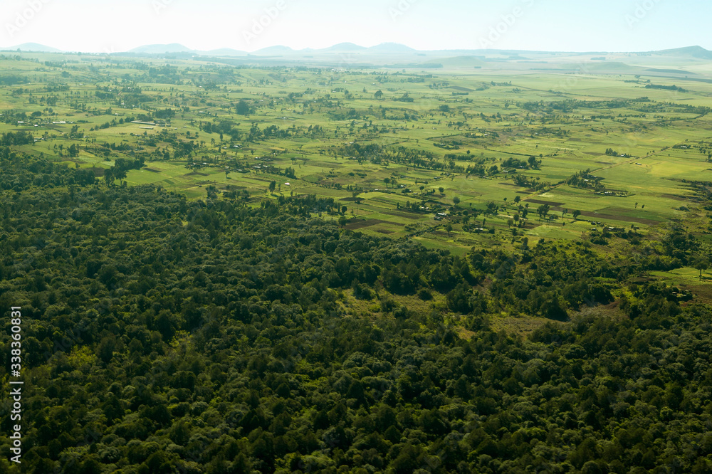 Aerials of Lewa Conservancy showing fence line of protected areas and encroaching farming in Kenya, Africa