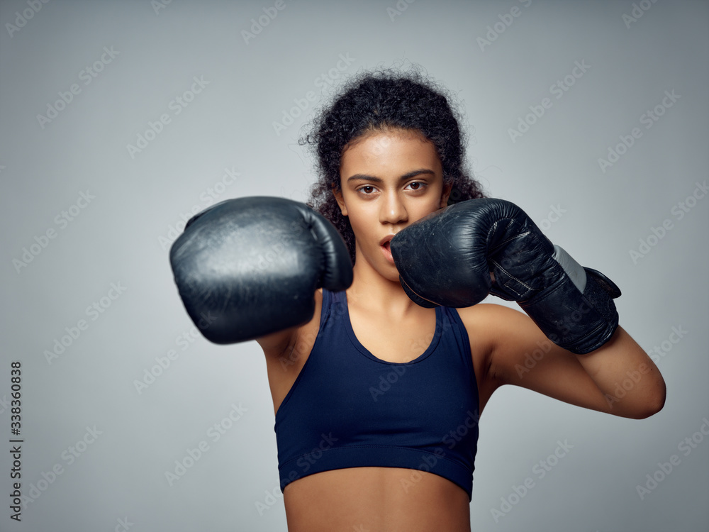 woman wearing boxing gloves