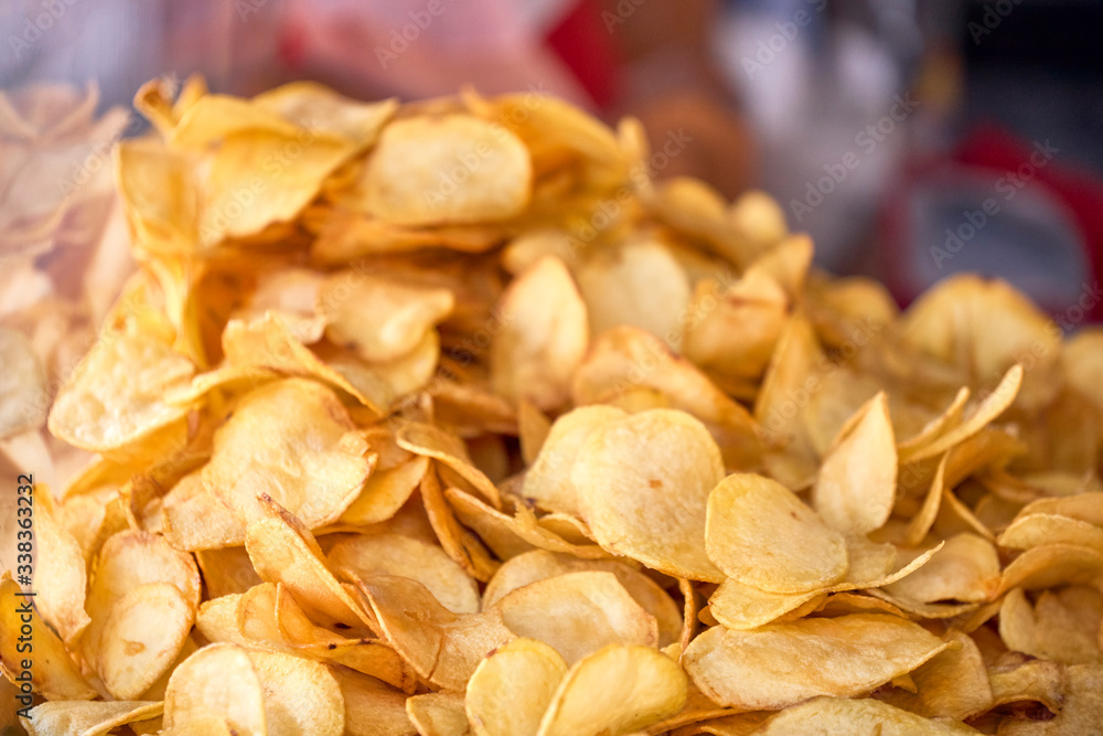 freshly made French fries at a stall on the street freshly made French fries at a stall on the street