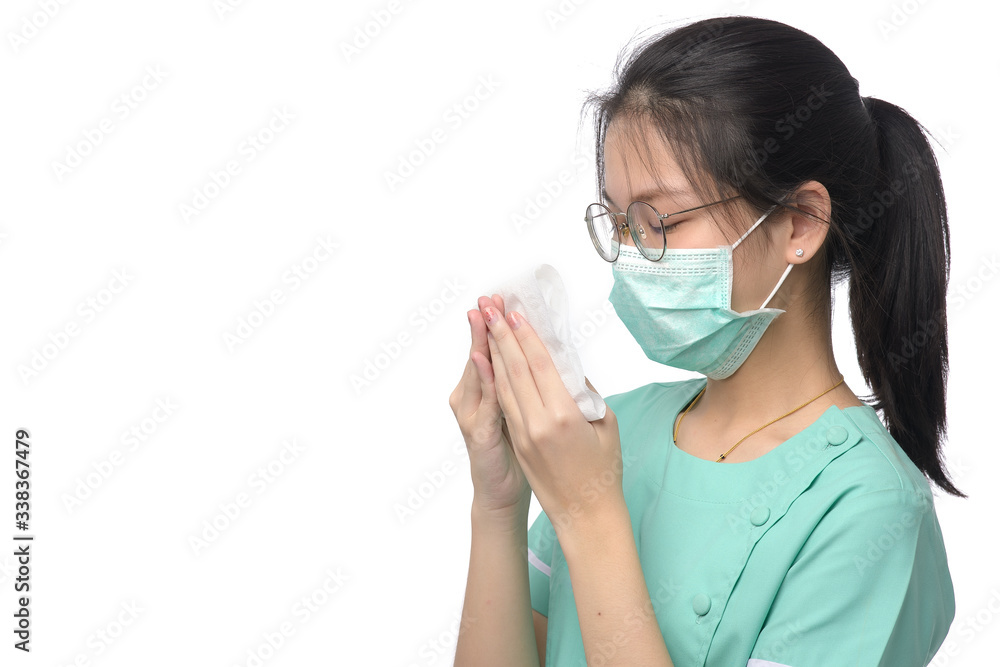 Portrait of asian doctor wearing medical face mask coughing and use tissue paper. Woman doctor use mask for protect virus on white background, free from copy space. Portrait of asian doctor wearing medical face mask coughing and use tissue paper. Woman doctor use mask for protect virus on white background, free from copy space.