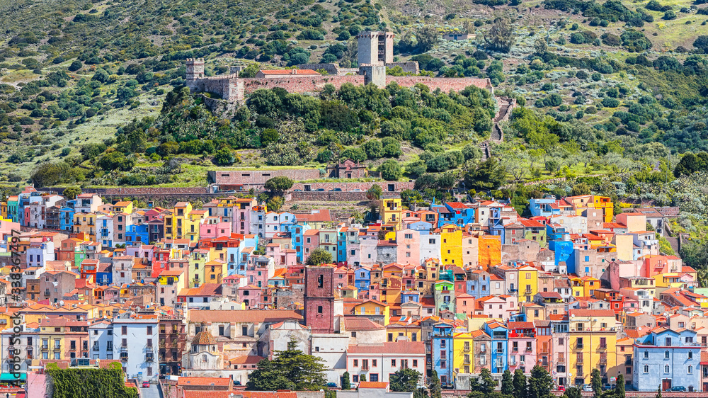 Wonderful morning panorama of colourful houses of old town Bosa in Sardinia