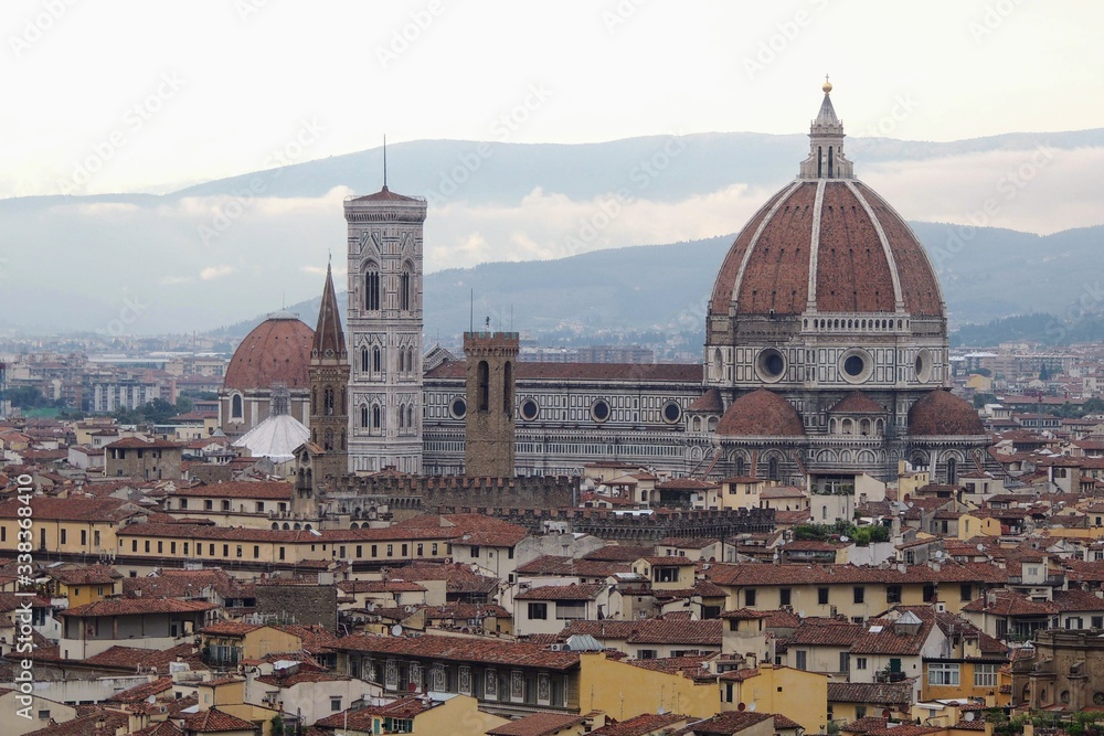 View of the city of Florence Italy at sunset highlights the Duomo and the Cathedral of Florence Santa Maria del Fiore.