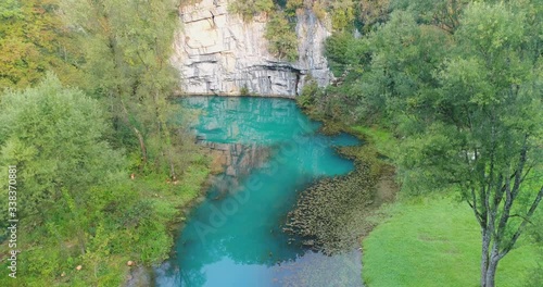 Aerial view of river Krupa Spring. Quiet waters and luxuriant forest , Semic. Pedestal Shot photo