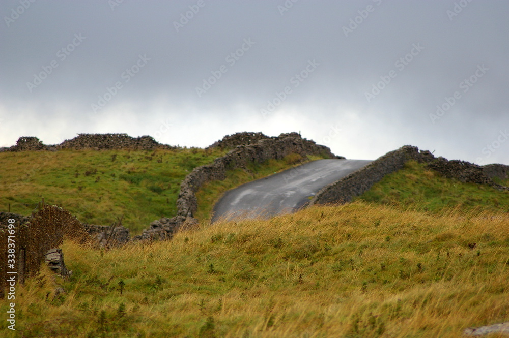 Hilly road rising above the fields in Yorkshire Hilly road rising above the fields in Yorkshire