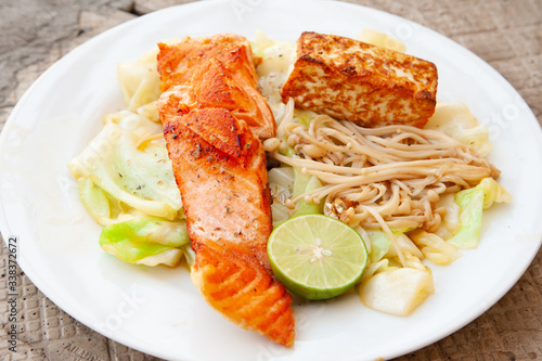 Grilled salmon steak with tofu and vegetable