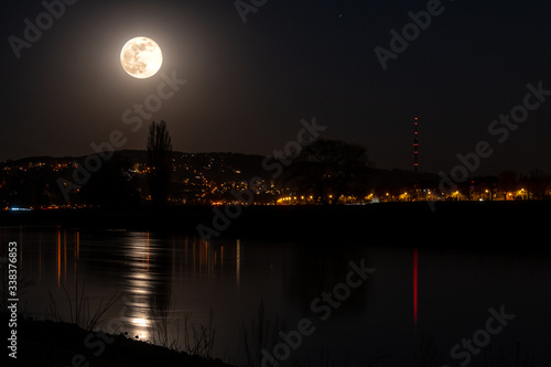 the supermoon above dresden city, skyline, elbe, saxony, germany