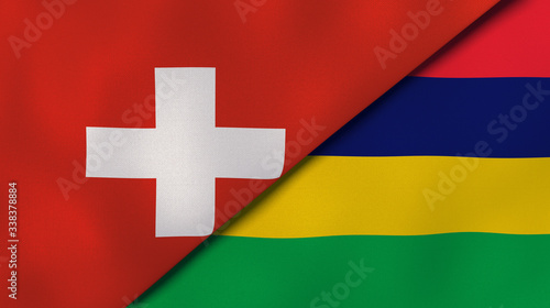 The flags of Switzerland and Mauritius. News, reportage, business background. 3d illustration photo