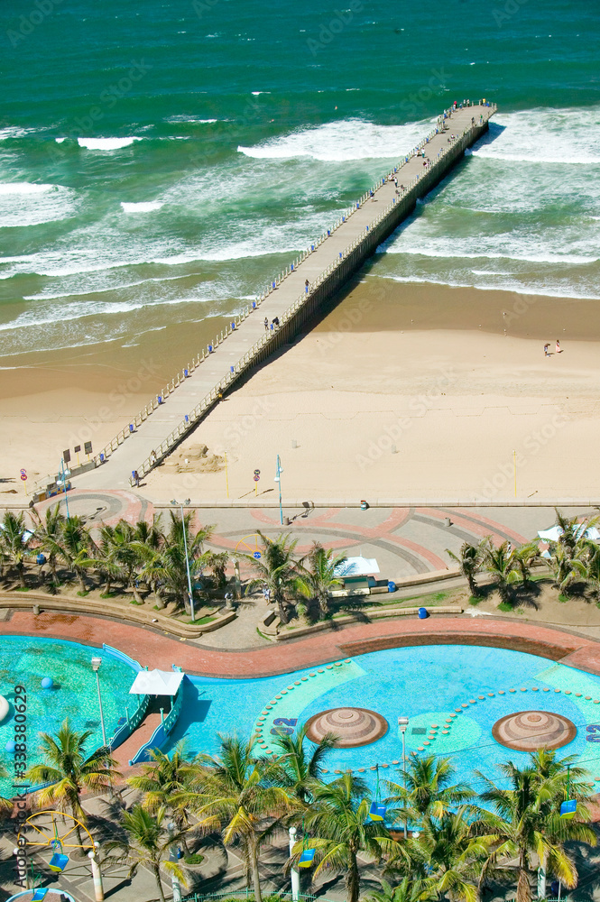 Fotografie Aerial view of Indian Ocean, white sandy beaches, pool and ocean pier in the tow