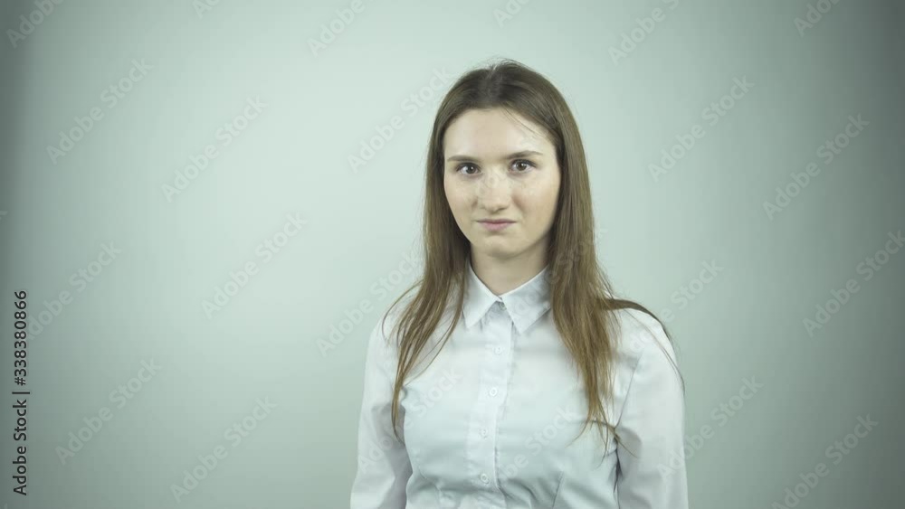 beautiful young woman in white blouse breathes deeply beautiful young woman in white blouse breathes deeply