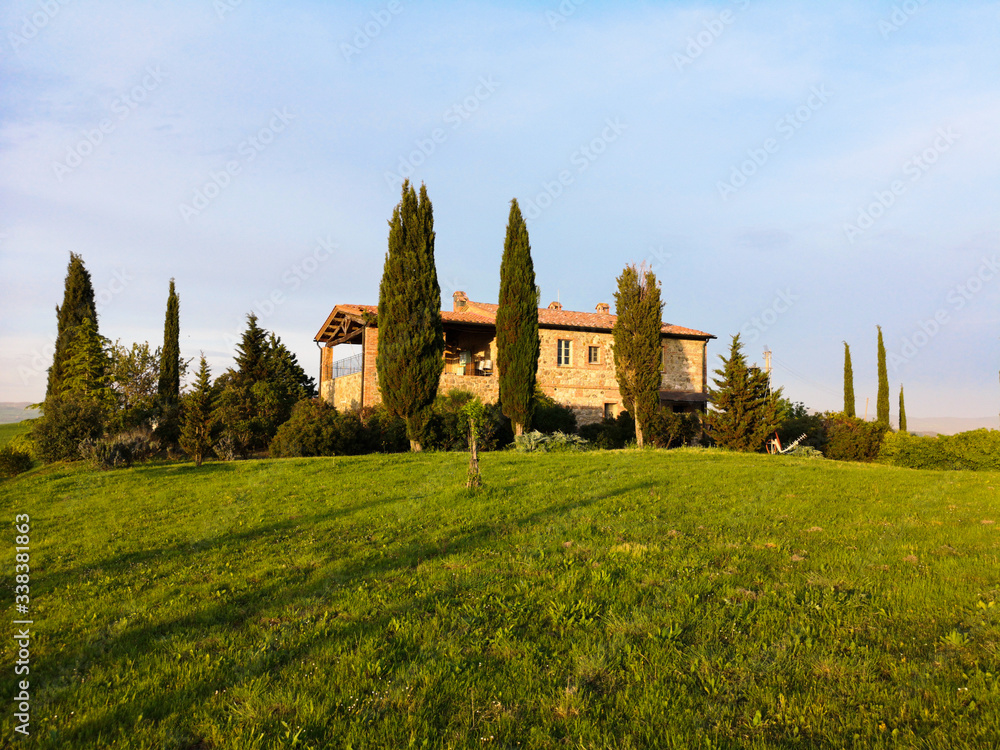 Typical stone farmhouse in the Tuscan hills.