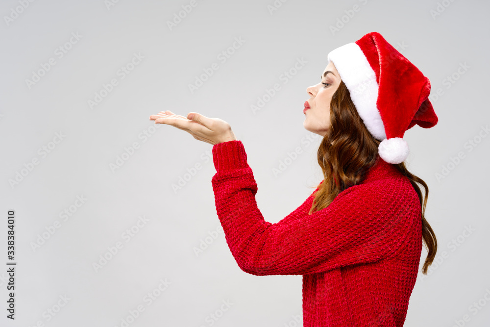 young woman in santa claus hat young woman in santa claus hat
