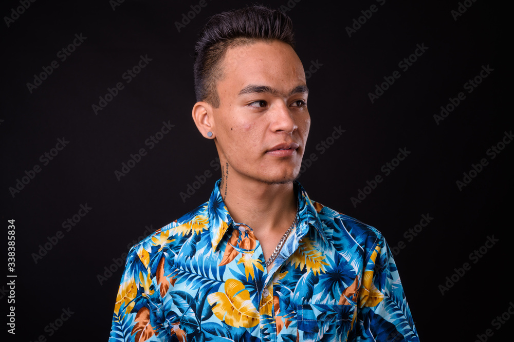 Face of young handsome Indian tourist man Face of young handsome Indian tourist man