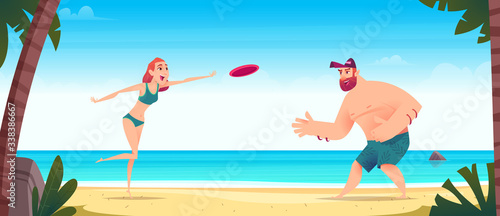 Young man and woman are playing with a flying disc on a sandy beach. Frisbee game concept