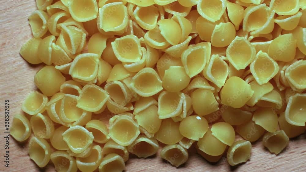 Italian pasta shells in a video close-up Italian pasta shells in a video close-up