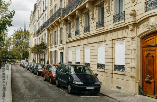 Typical old Paris architecture and deserted streets with no tourists while citizens stay at home in self isolation. Residential buildings facades, expensive real estate concept, economy crisis © sergiymolchenko