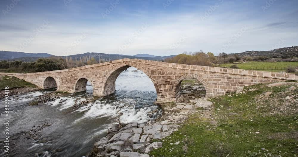 Assos, Canakkale, Turley. Old stone Hudavendigar bridge. Timelapse video in 4K. Assos, Canakkale, Turley. Old stone Hudavendigar bridge. Timelapse video in 4K.