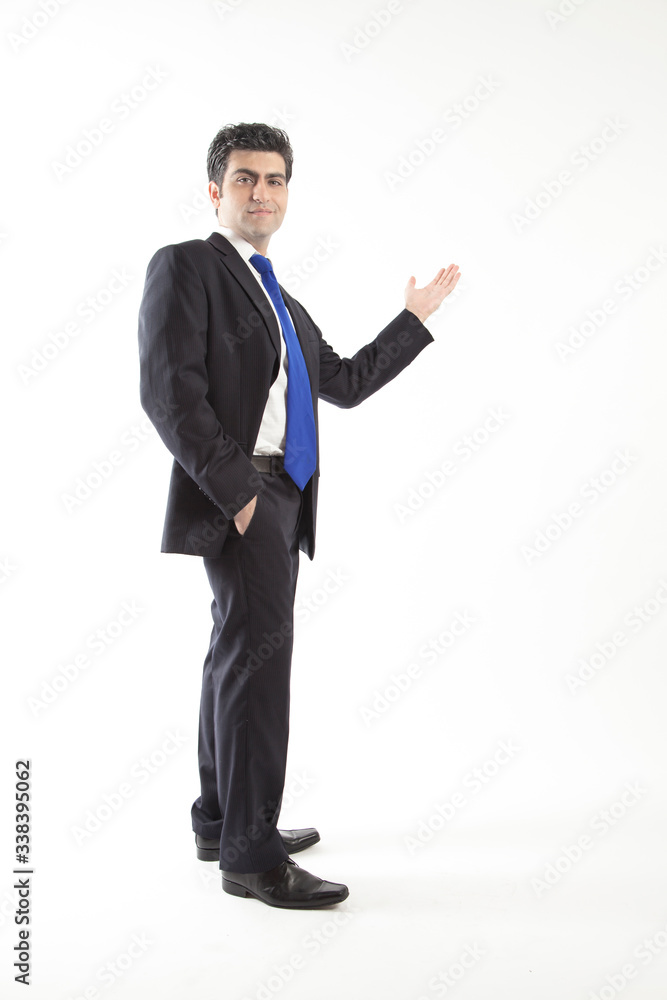 Young business man presenting with blank background Young business man presenting with blank background