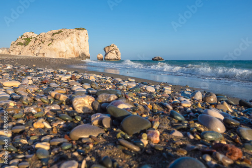 Cyprus. Rock Aphrodite. Petra tou Romiu. Near the village of Kuklia. Landscapes of the Mediterranean. Rocks near the shore. Beaches of Cyprus. Aphrodite against the blue sky. Sights of Cyprus. photo