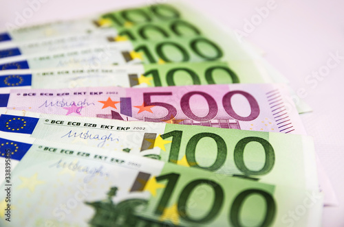 500 Euro banknote among 100 Euro banknotes.