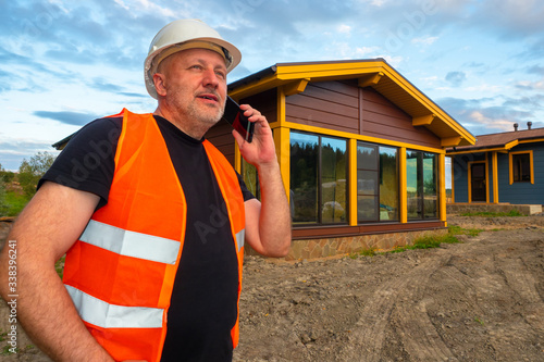 Builder talking on the phon...