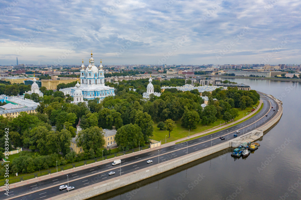 Fototapeta premium Saint Petersburg. Cathedrals of Russia. Smolny Cathedral. Panorama of St. Petersburg. Neva River. Highway in St. Petersburg. Smolny Cathedral aerial view. Tours of the temples of Russia. Russia road