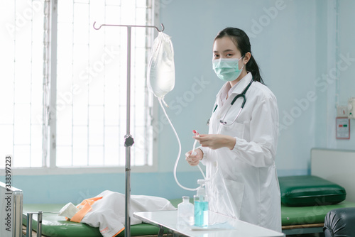 a female doctor showing how to dialysis