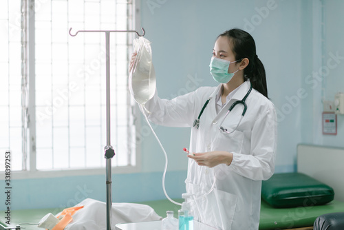 a female doctor showing how to dialysis