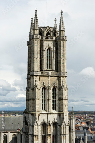 tower of St Nicholas Church in Ghent, Flemish Region / Belgium  photo