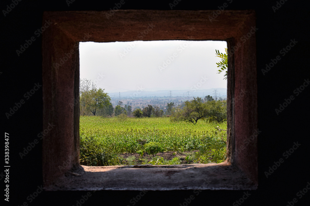 view of a agricultural land thru window of a house view of a agricultural land thru window of a house