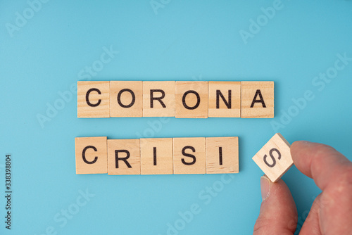 Corona Virus infection concept. Letter of wooden blocks