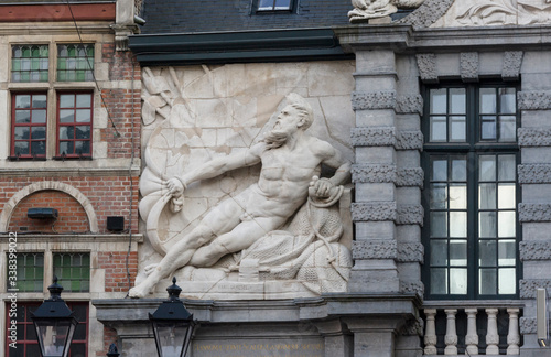 Ghent, Flemish Region / Belgium - april 24 2012 : Neptune monumental gateway (1689) to the Old Fish Market in Ghent, Belgium