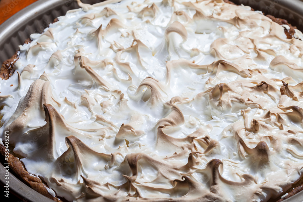 Freshly baked lemon pie. Lemon Kurd Tart with Meringue Freshly baked lemon pie. Lemon Kurd Tart with Meringue