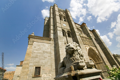 Lion statue in front of Catedral de çvila Ð çvila Cathedra, Cathedral of Avila, the oldest Gothic church in Spain in the old Castilian Spanish village of Avila photo