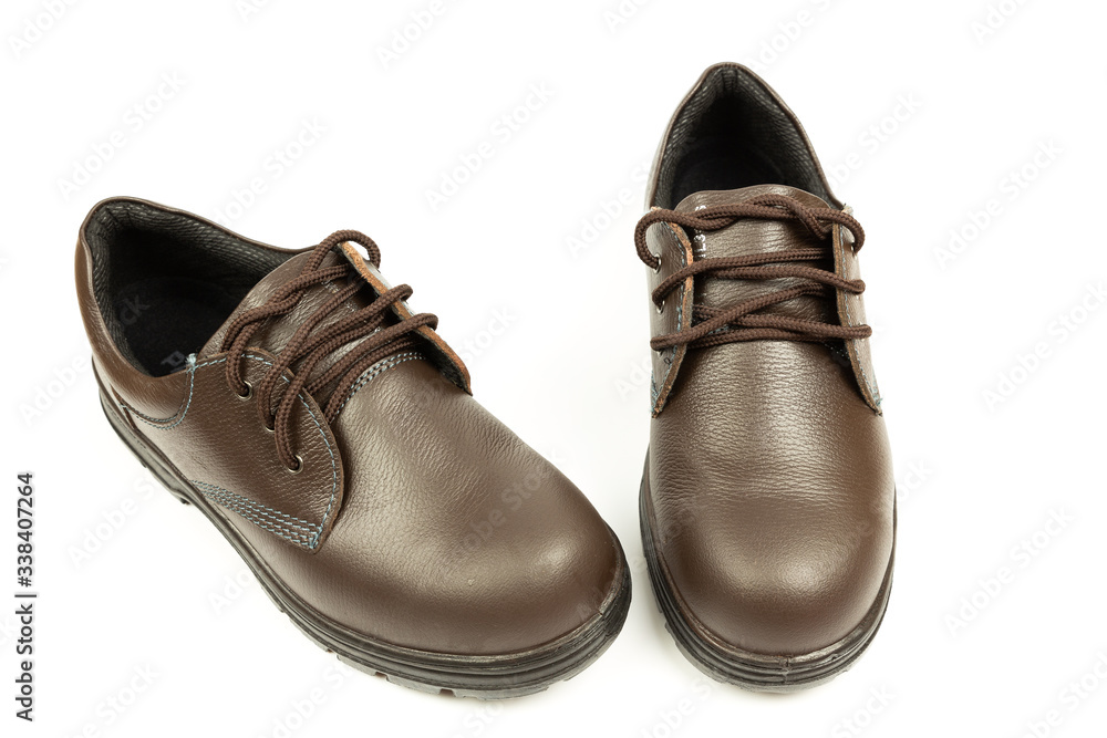 Shoes safety isolated on white background. Oil and acid resistant shoes. Safety boots isolated on white background. Work Boots for industry. Shoes safety isolated on white background. Oil and acid resistant shoes. Safety boots isolated on white background. Work Boots for industry.