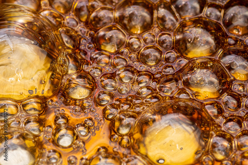 boiling sugar with bubbles turns into caramel, caramelization