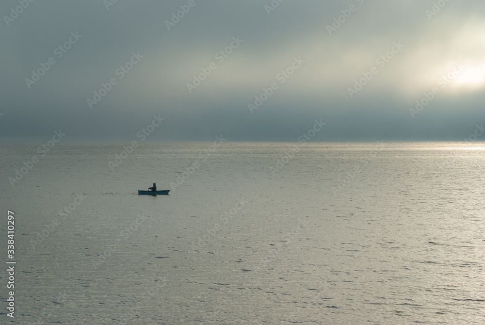 boat on the lake on a foggy morning