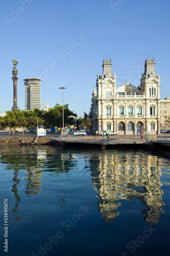 Morning water reflections of building at Port Vell, Old Harbor, Barcelona, Spain