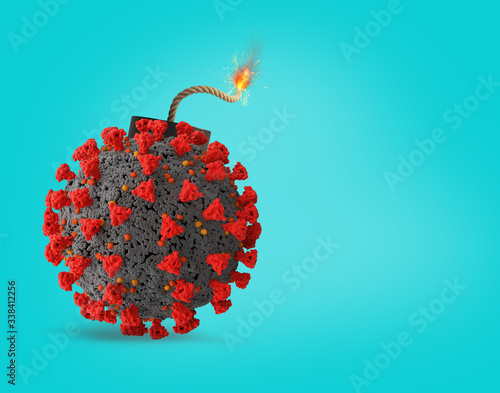 Coronavirus covid-19 ready to explode like a bomb. Concept of dangerousness. cyan background photo