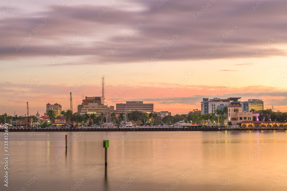 Bradenton, Florida, USA downtown on the Manatee River at dusk.