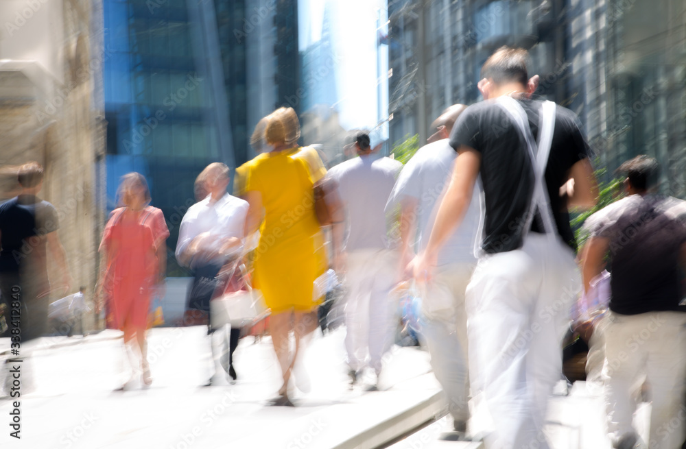 Obraz premium Lots of business people walking in the City of London. Blurred image of the road with people at sunny day. London, UK