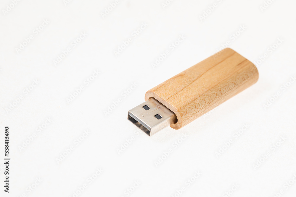 Wooden USB flash memory isolated on white background. Wooden USB flash memory isolated on white background.