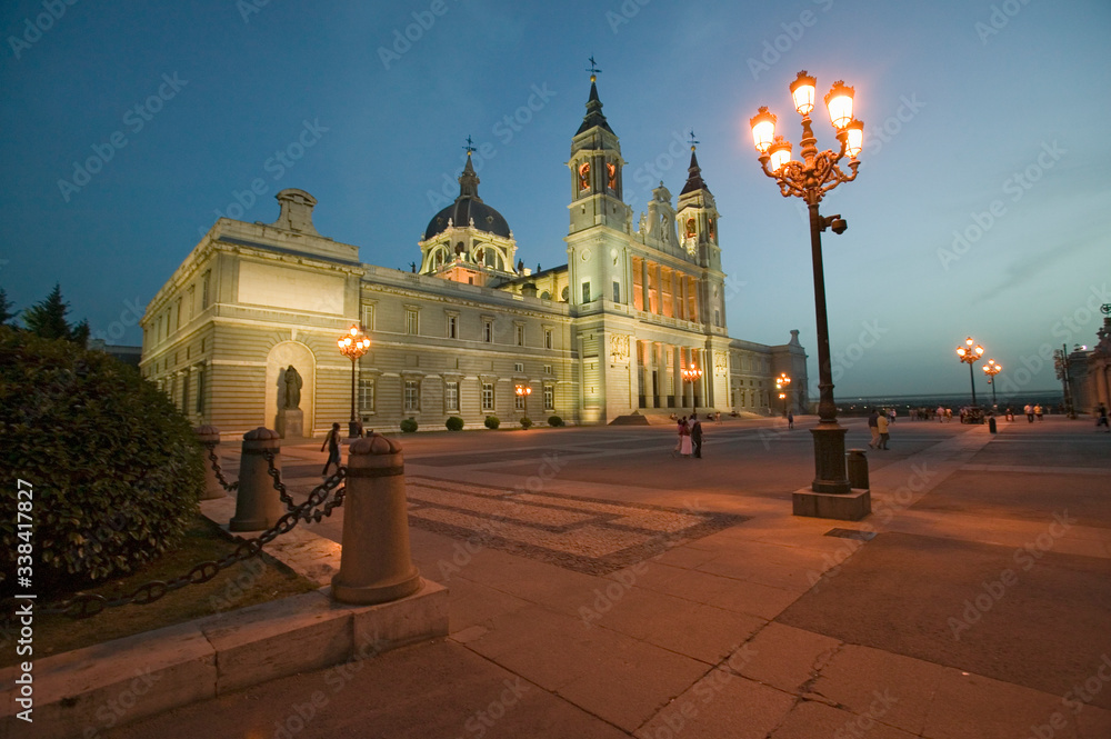 Twilight and lights coming on at Royal Palace in Madrid, Spain