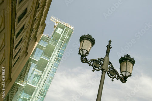 Looking up to a view of a street lamp and the Barcelona Museum of Contemporary Art, Barcelona, Spain photo