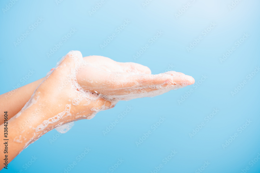 woman washing hands with soap have foam