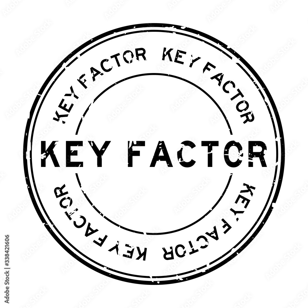 Grunge black key factor word round rubber seal stamp on white background