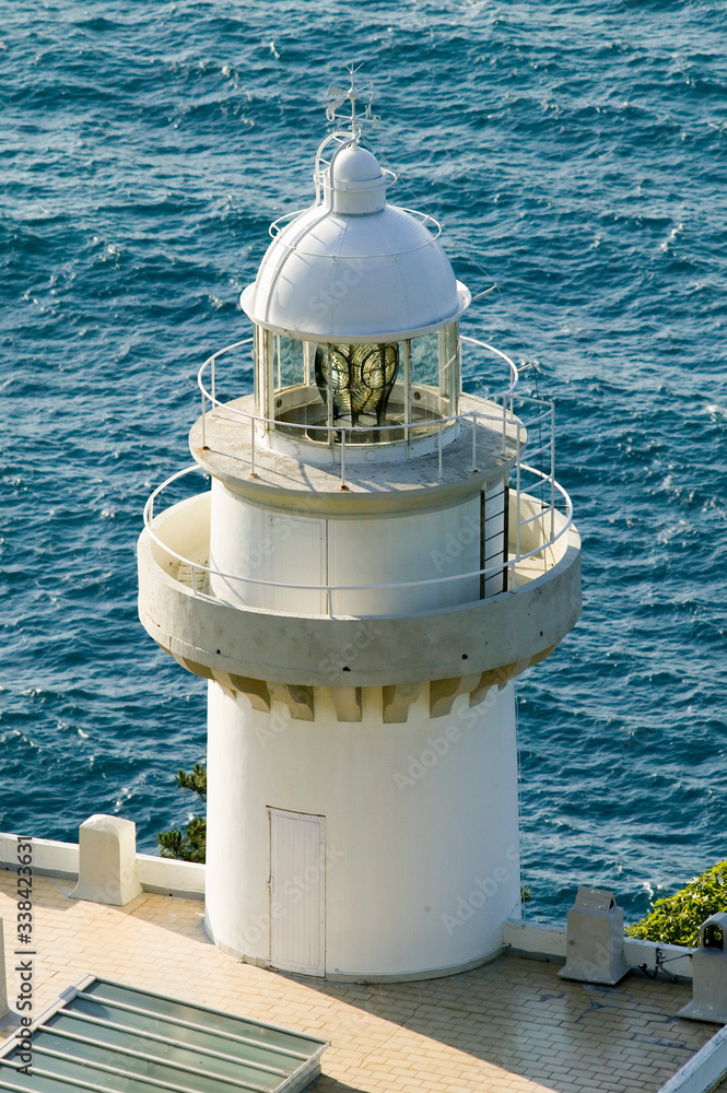 A lighthouse at Donostia-San Sebastian, Basque region of Spain, the Queen of Euskadi's and Cantabrian Coast, as seen from Monte Igueldo overlook view spot - obrazy, fototapety, plakaty 