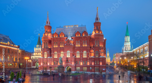The State Historical Museum and part of the Kremlin on the Red square in Moscow, Russia at night. View from Manezhnaya Square.