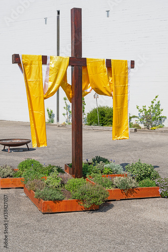 Auferstehungskreuz vor der katholischen Kirche, Muttenz, Kt. Baselland, Schweiz photo