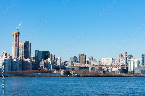 Wallpaper Mural Midtown Manhattan Skyline along the East River in New York City with the Queensboro Bridge Torontodigital.ca