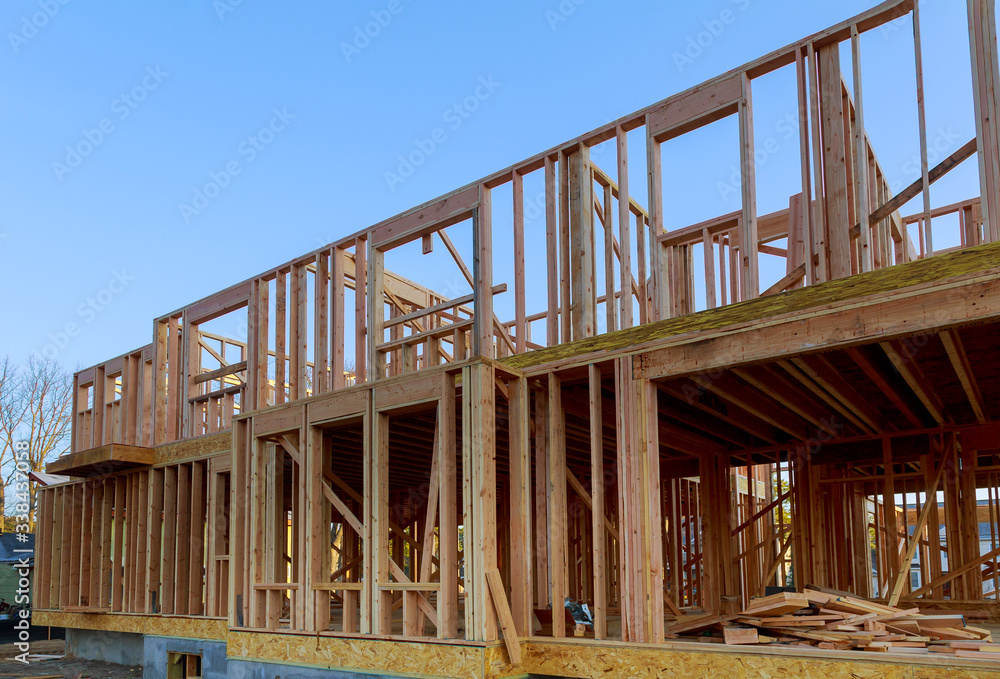Building of New Home Construction exterior wood beam construction Building of New Home Construction exterior wood beam construction
